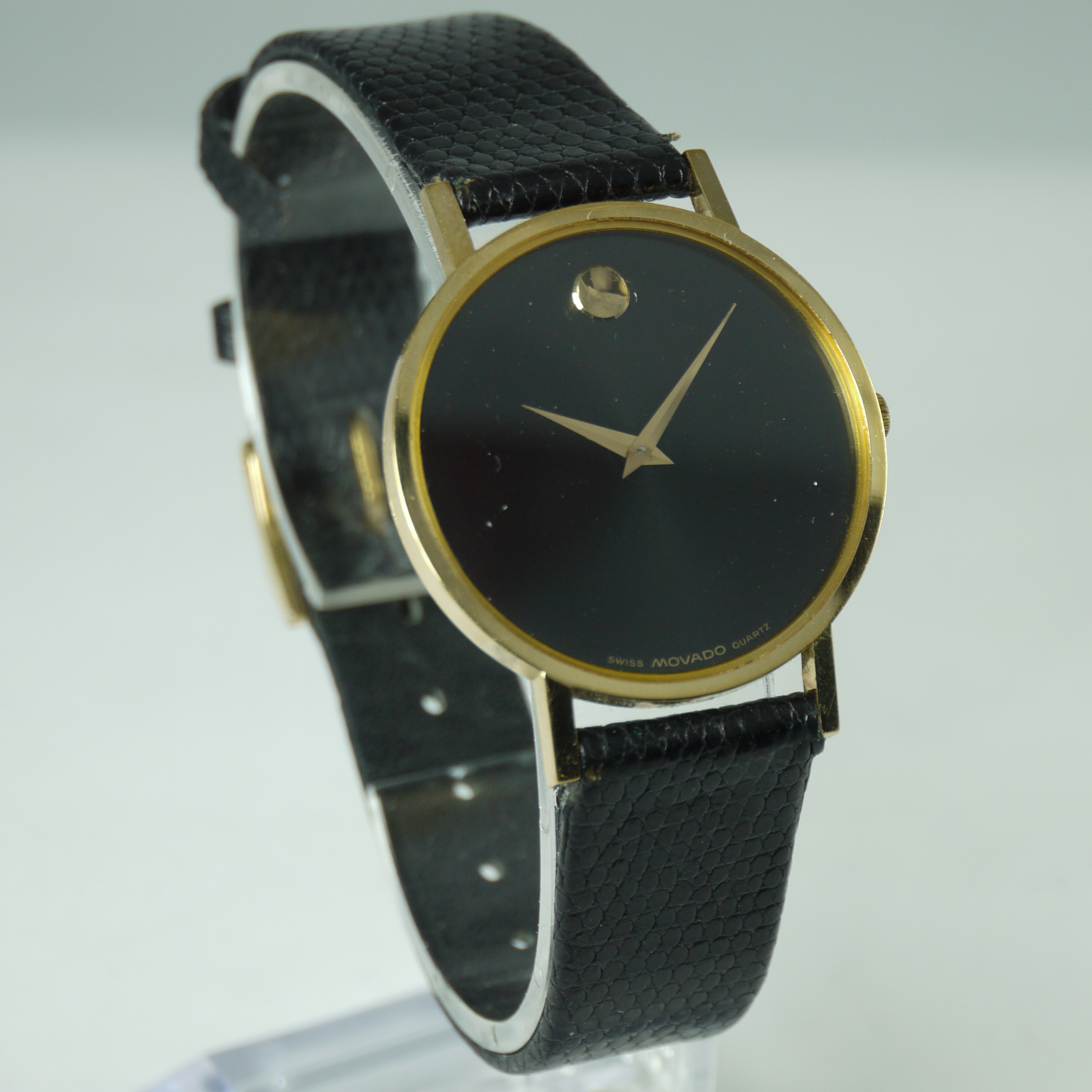 Movado Quartz Museum Watch in 14 karat yellow gold on black leather band