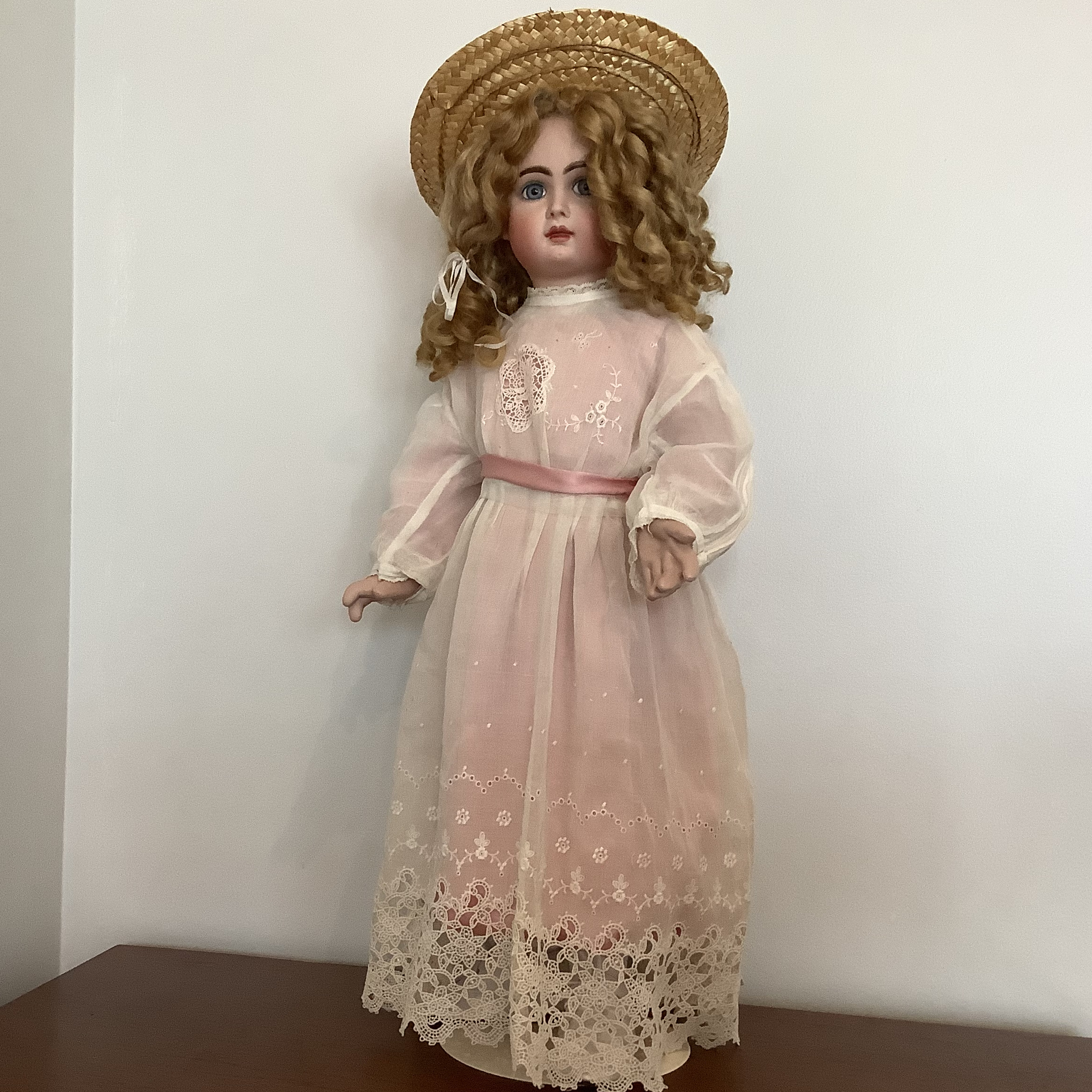 Reproduction Jumeau Arielle in a pink and white dress with embroidery and cutwork
