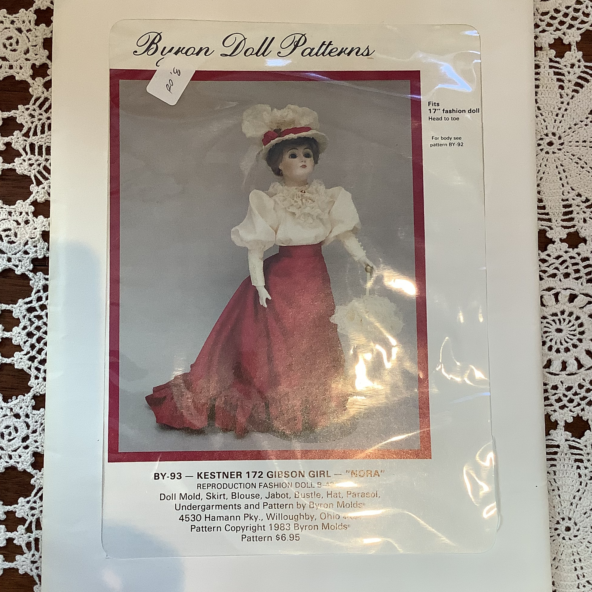 Sewing pattern to make a set of skirt, blouse, hat and parasol for a 17-inch lady doll