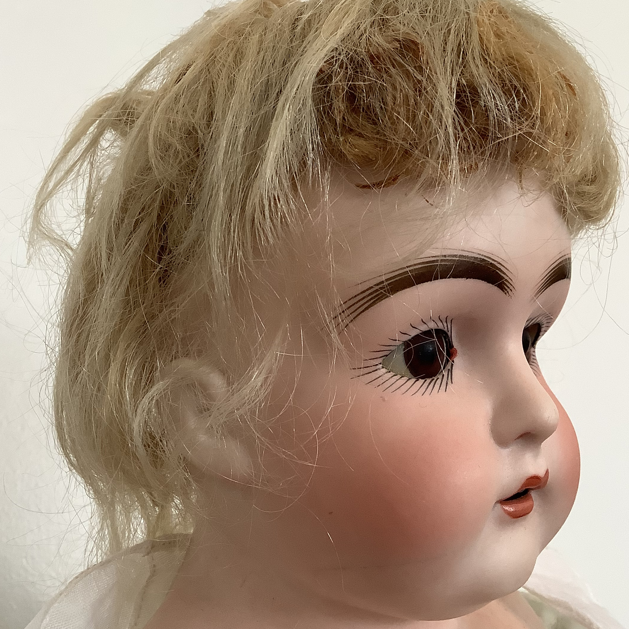 Face of antique doll