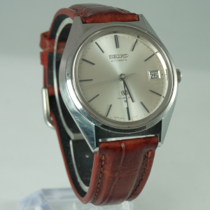 Grand Seiko Automatic wristwatch in stainless steel with a brown leather band