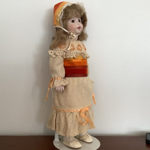 SFBJ Twirp doll in crocheted dress and matching velvet ribbon bonnet