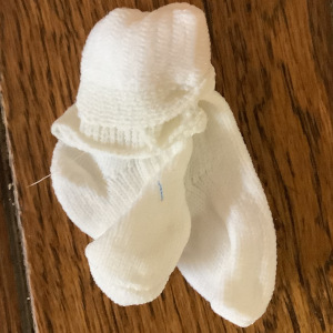 Small white nylon socks in thin knit fabric