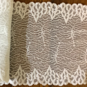 Lace with a wavy scalloped pattern
