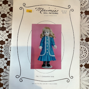 Sewing pattern to make lace-trimmed dress for 7-inch child doll