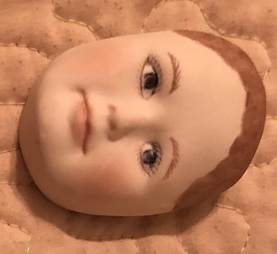 Brooch baby face