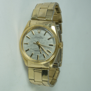 1971 Rolex 1005 Oyster Perpetual Chronometer wristwatch in 18 karat yellow gold with original gold band